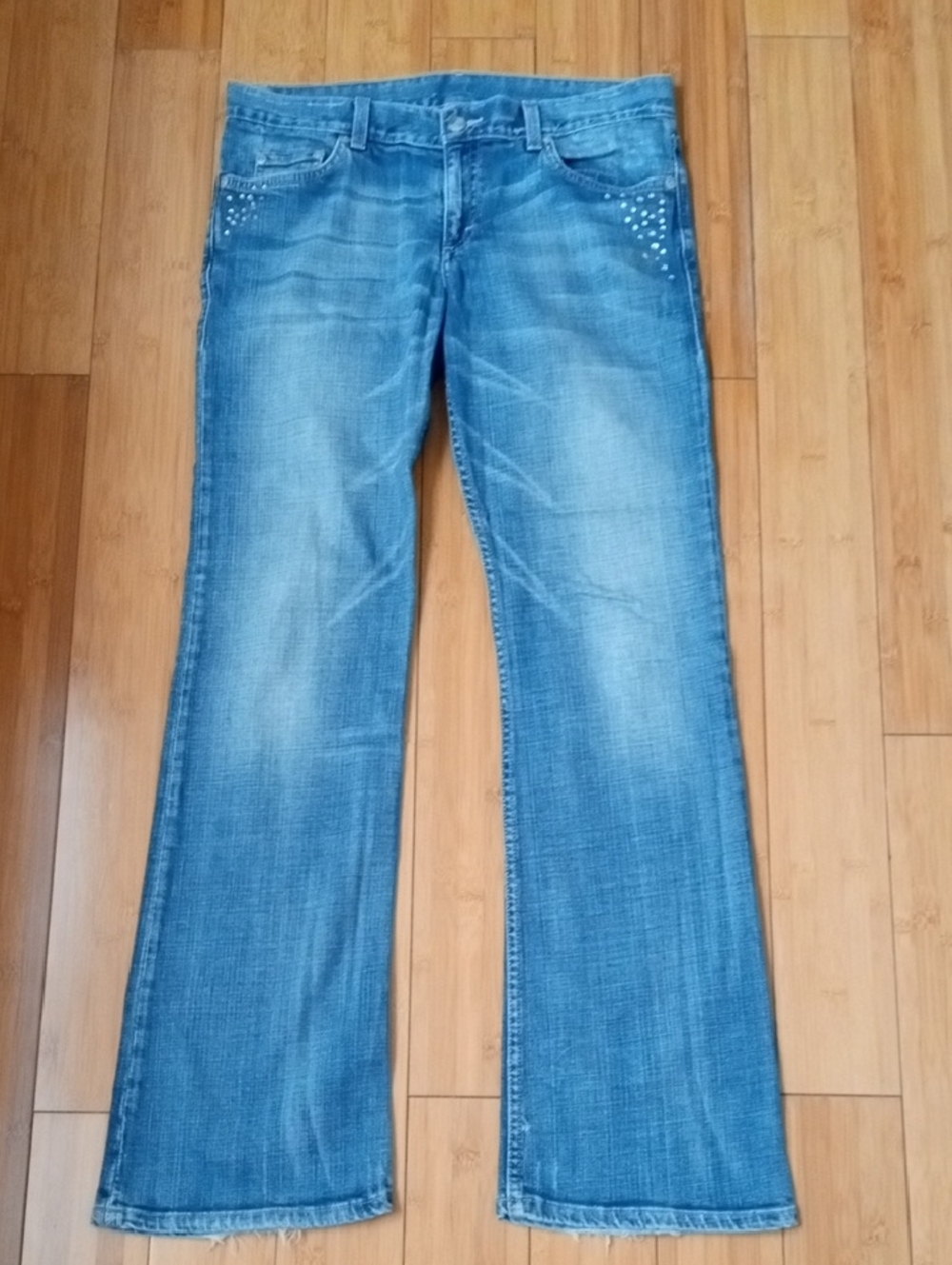 Divided Distressed Low Boot Cut Jeans with Rhinestone Accents. Size 29